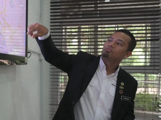 Presenter discussing a geospatial map